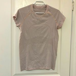 Light pink Lululemon T-shirt